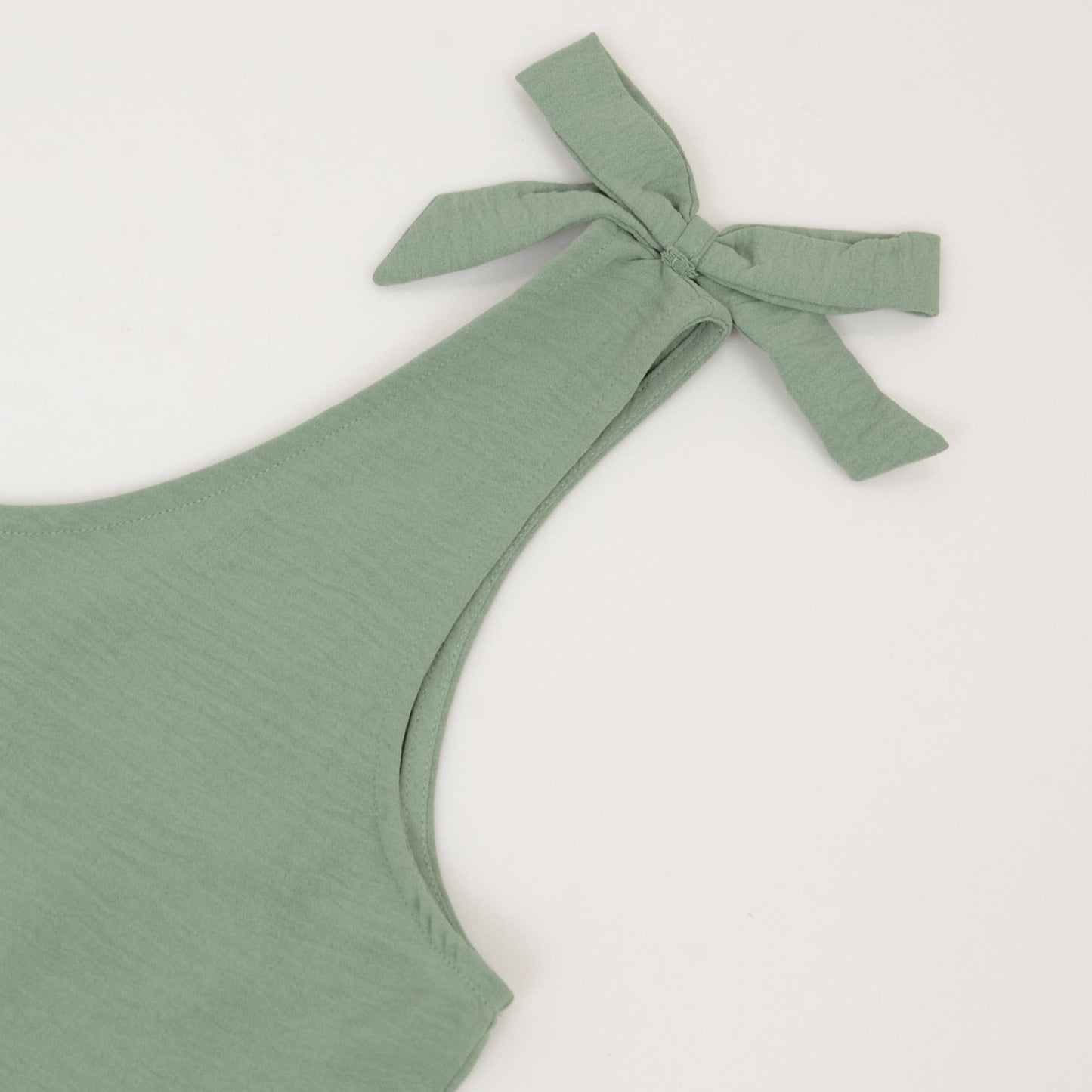Sleeveless Peplum Tank Top with Tie Shoulder Straps